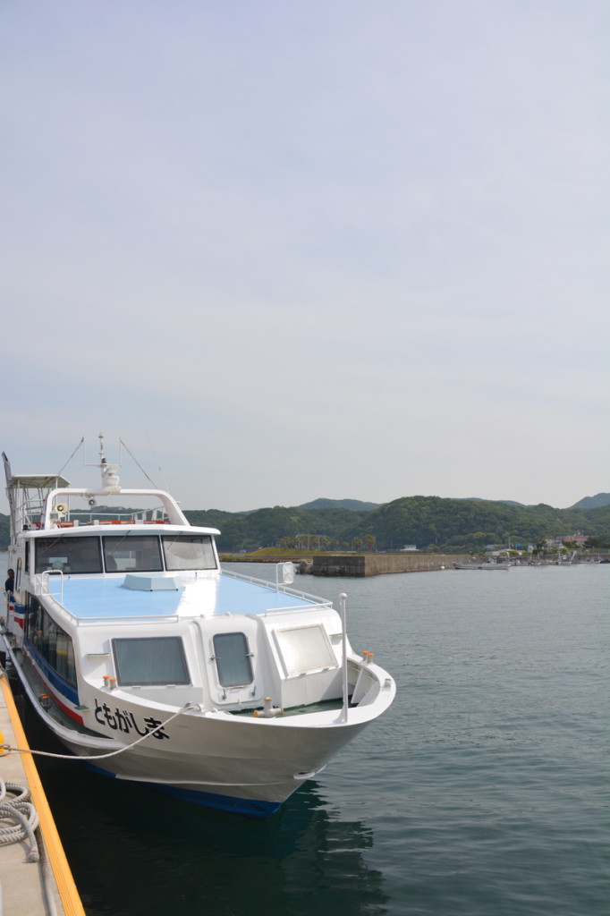 A ship for Okino-shima. Many passengers.